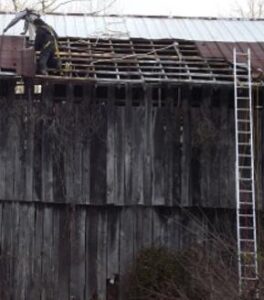 Fixing an old barn roof Image